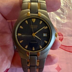 Citizen Titanium Watch with Black and Gold Accents